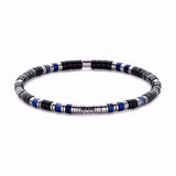 Guld & Sølv Design Armbånd med sorte og blå sten og stål elementer 7FB-0759